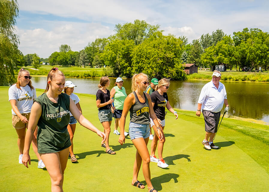 Golfers enjoying an outdoor activity