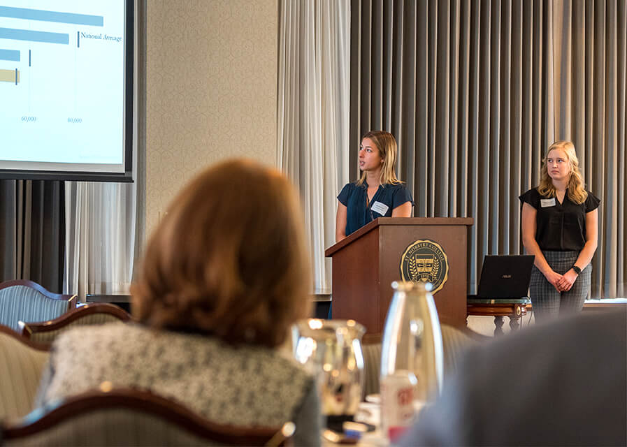 A speaker presenting at an event